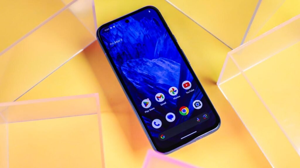 Google's Pixel 8A on a yellow background